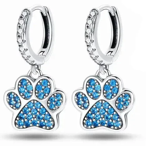 Silver Paw Print Dangle Earrings with Blue Crystals