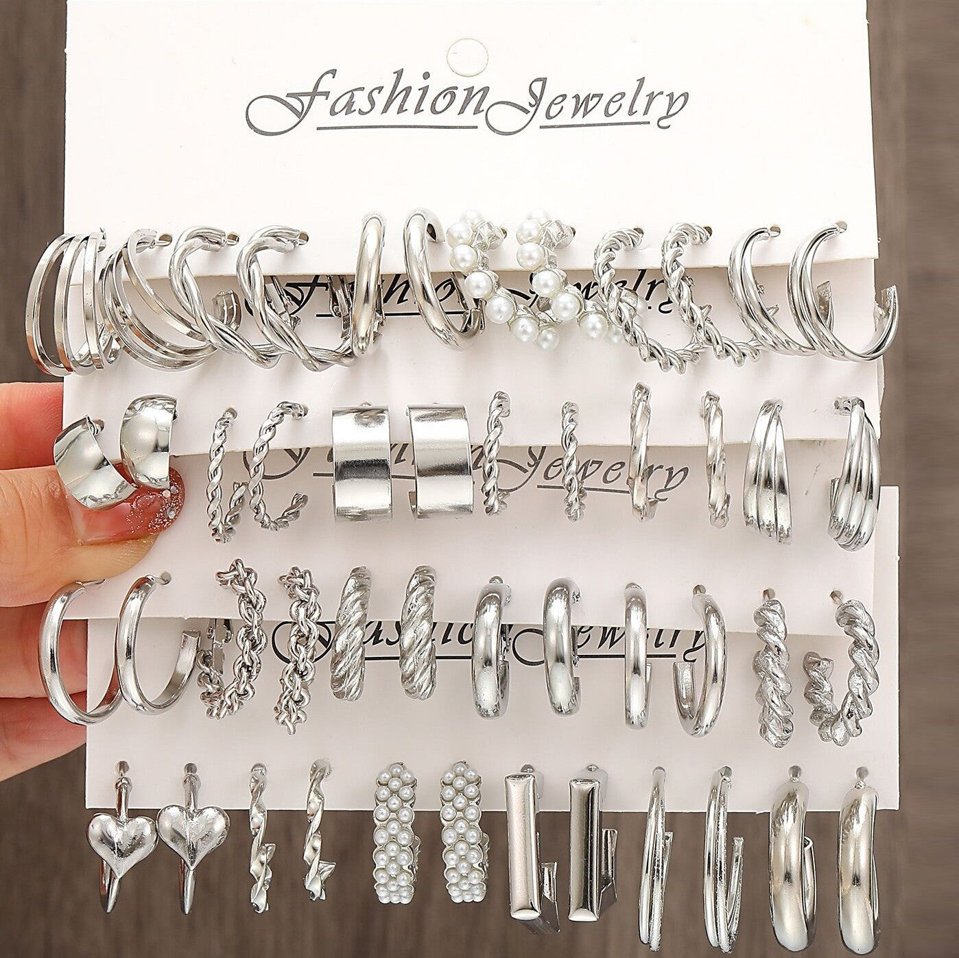 Cross-border hot selling metal twist earrings set 24 pieces simple C-shaped pearl earrings earrings with three-tube pearls