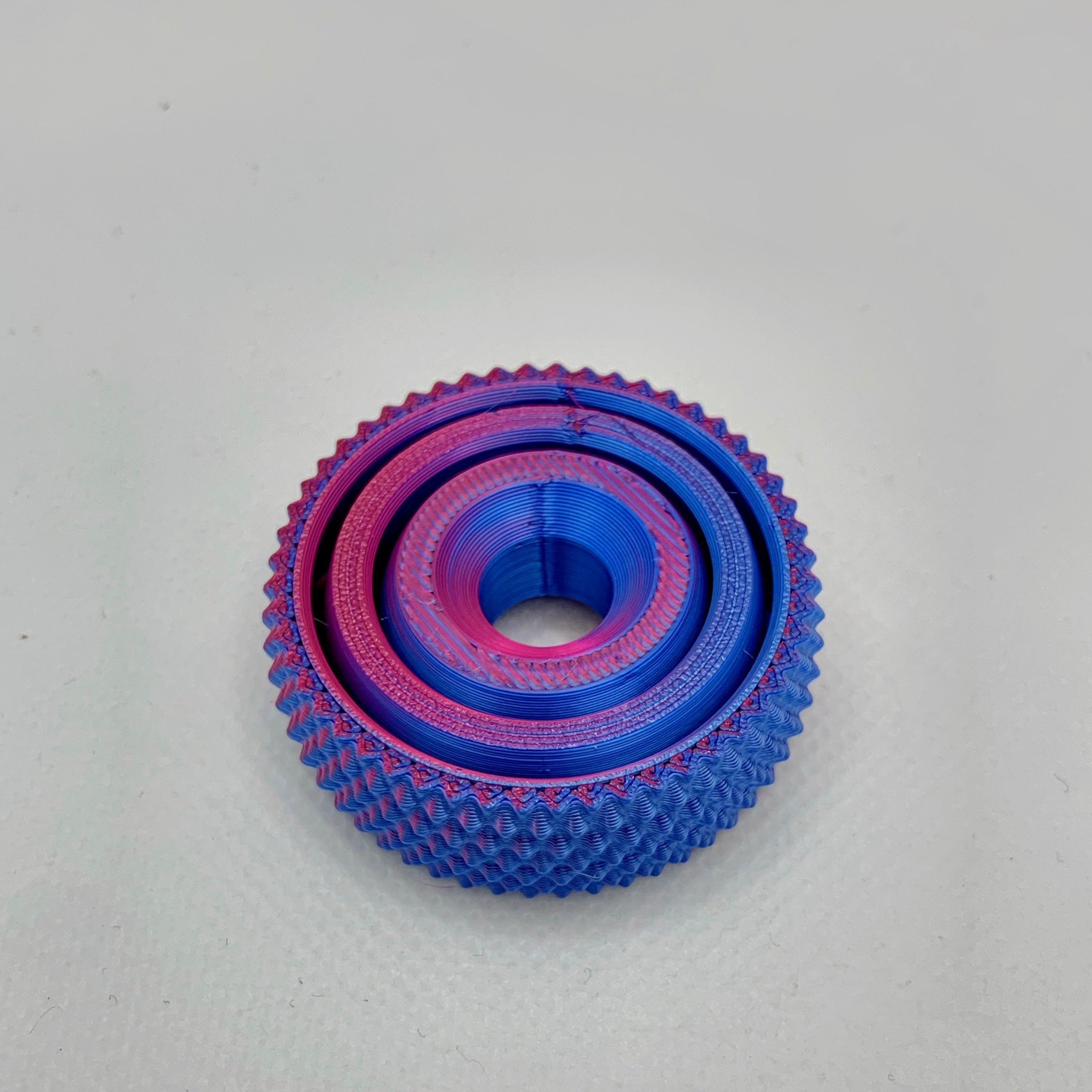 Blue Raspberry Dual Colored Textured Gyro Fidget