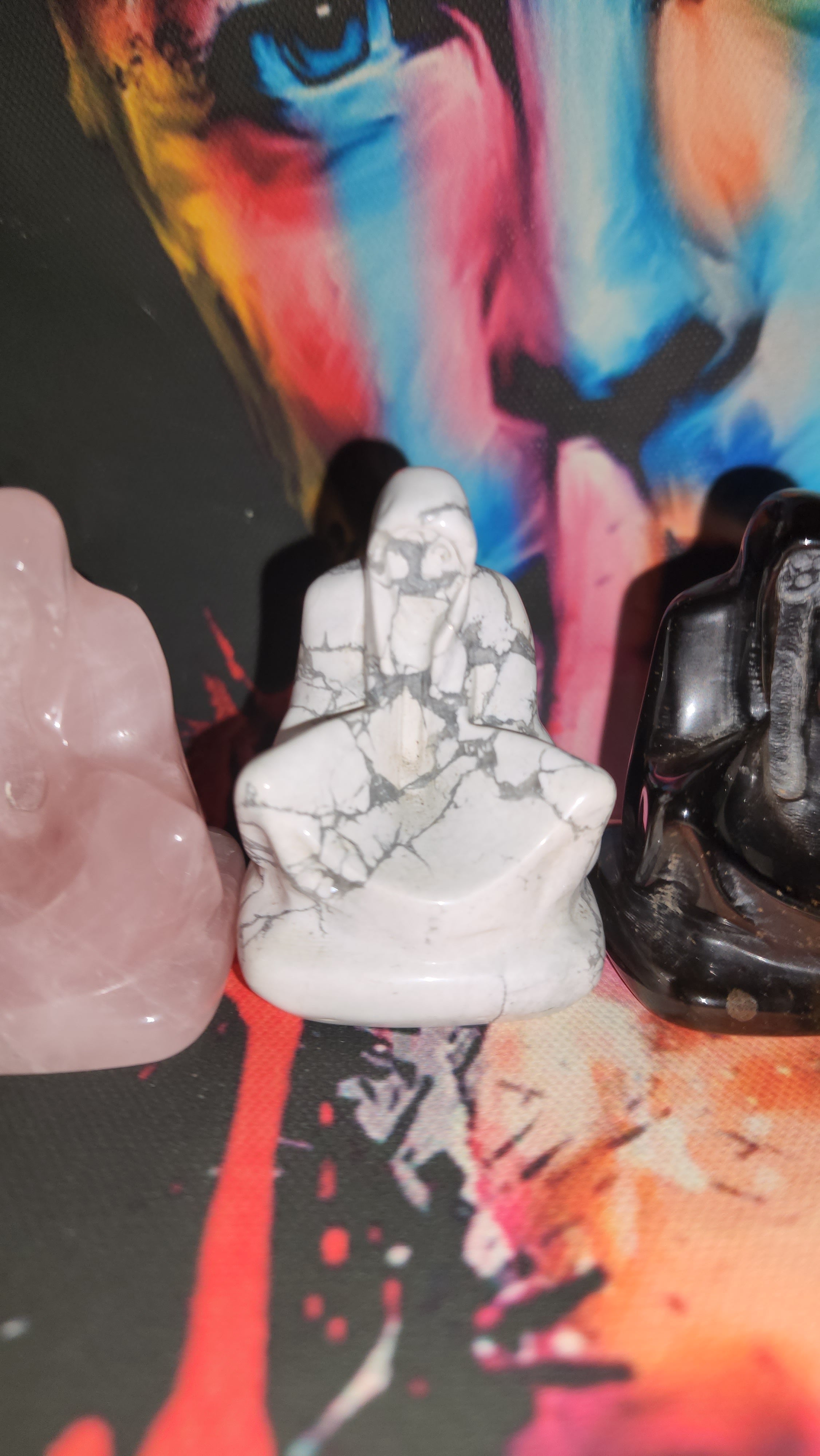 Sitting angel of death carvings