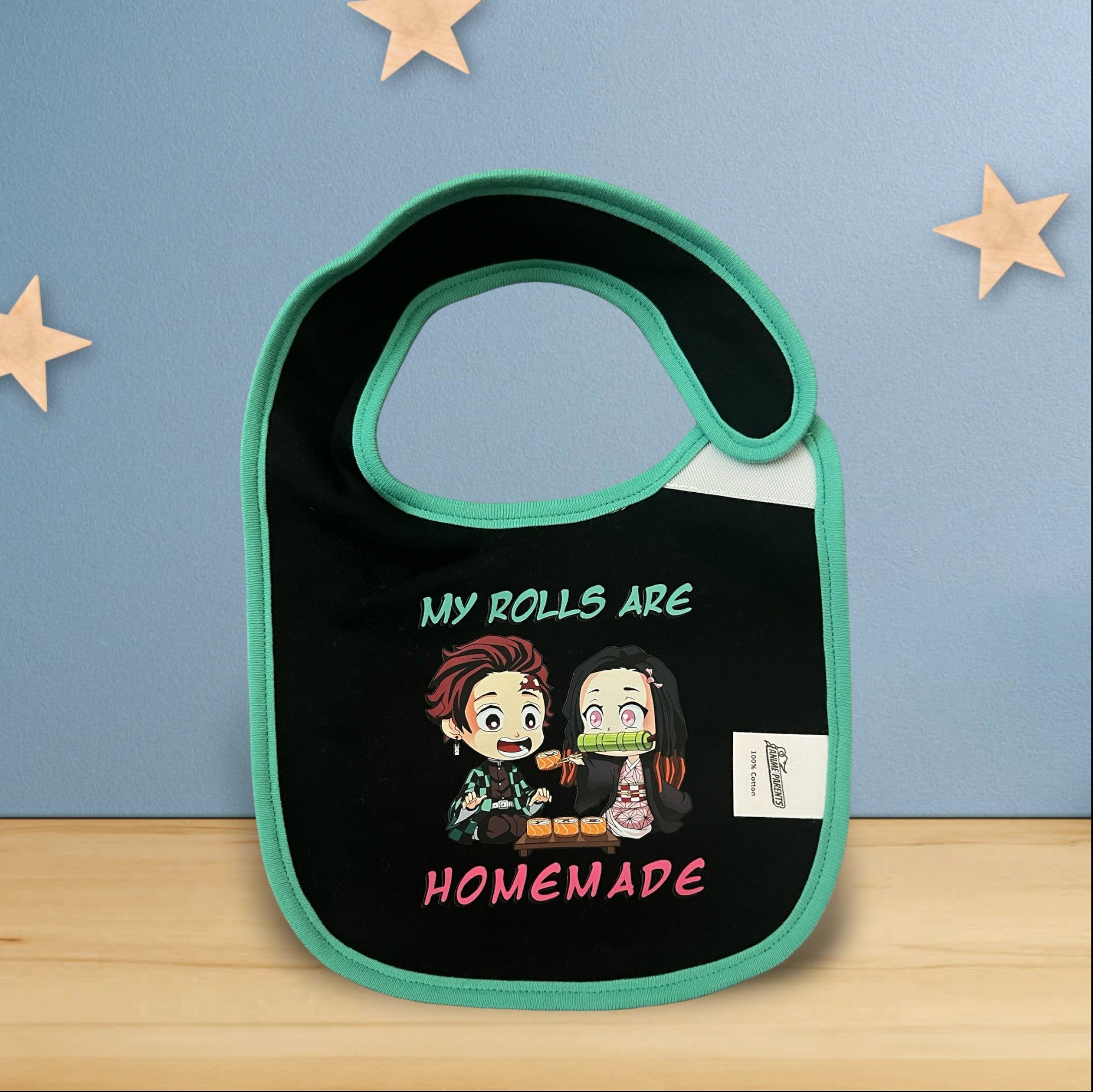 Demon Slayer Anime Baby Bib for babies saying, "My Rolls Are Homemade"