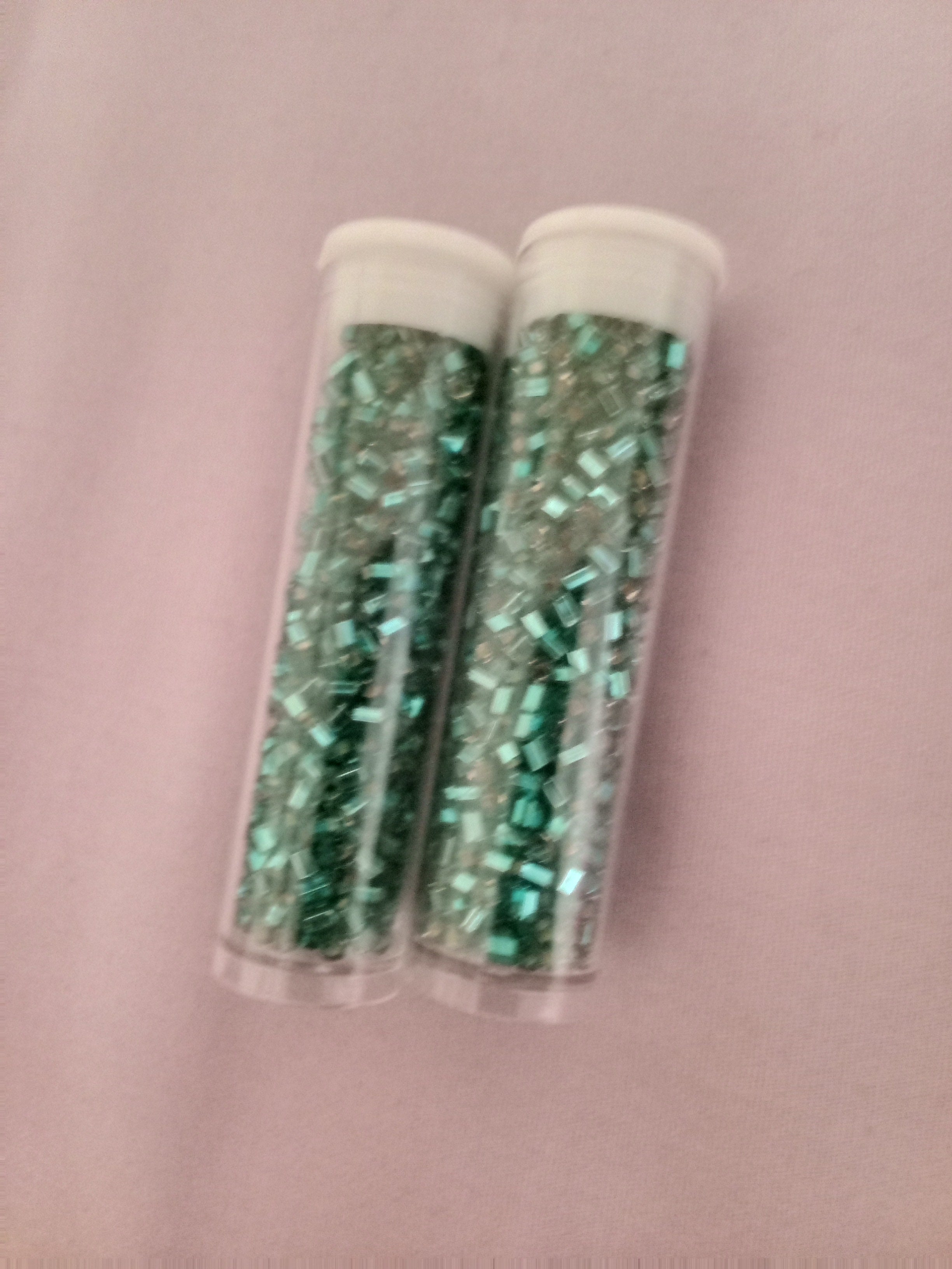 These are cylinder 11/0 seed beads look like delicas but 8/0