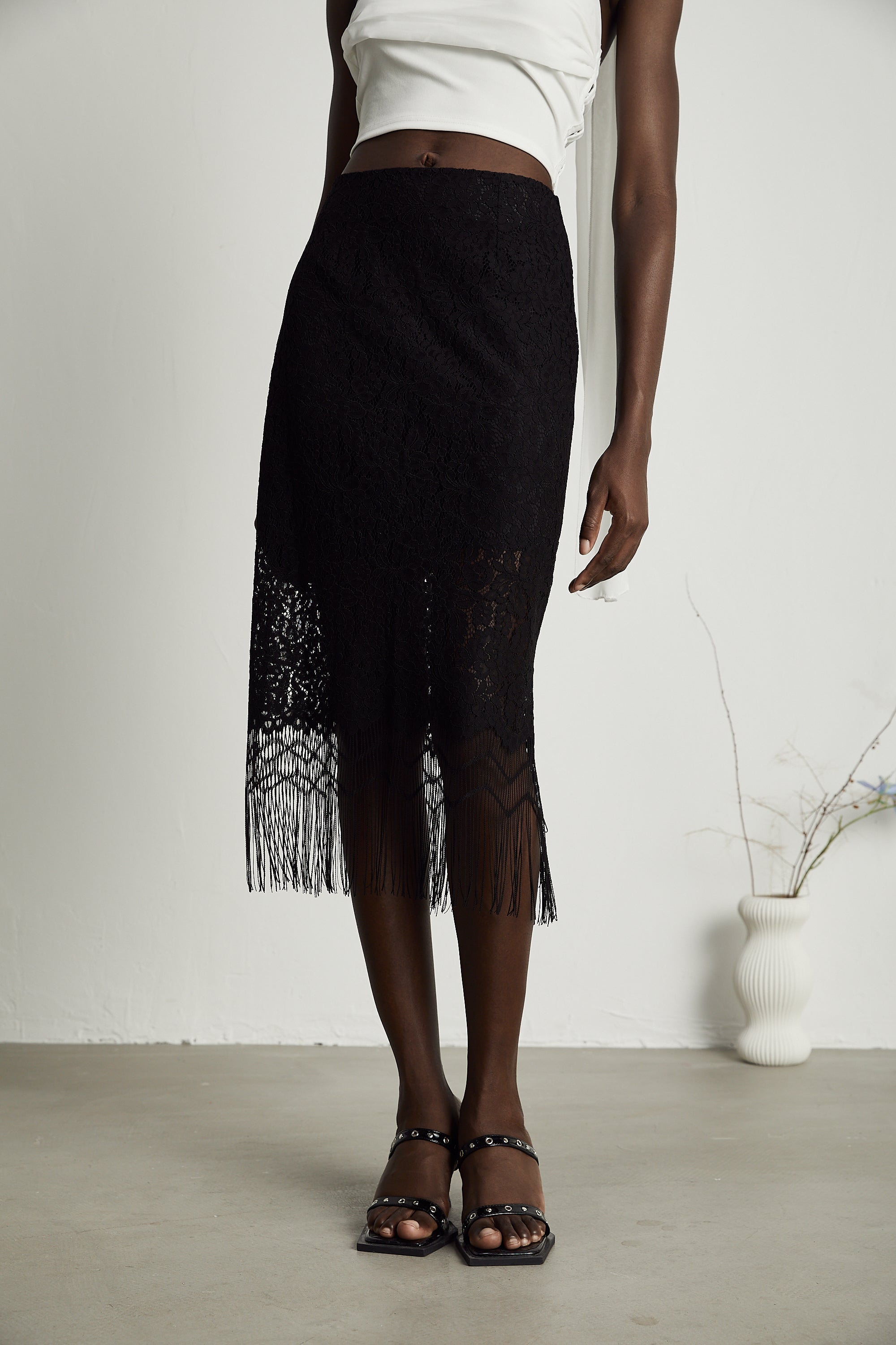 Adèle lace embroideried fringe-hem skirt