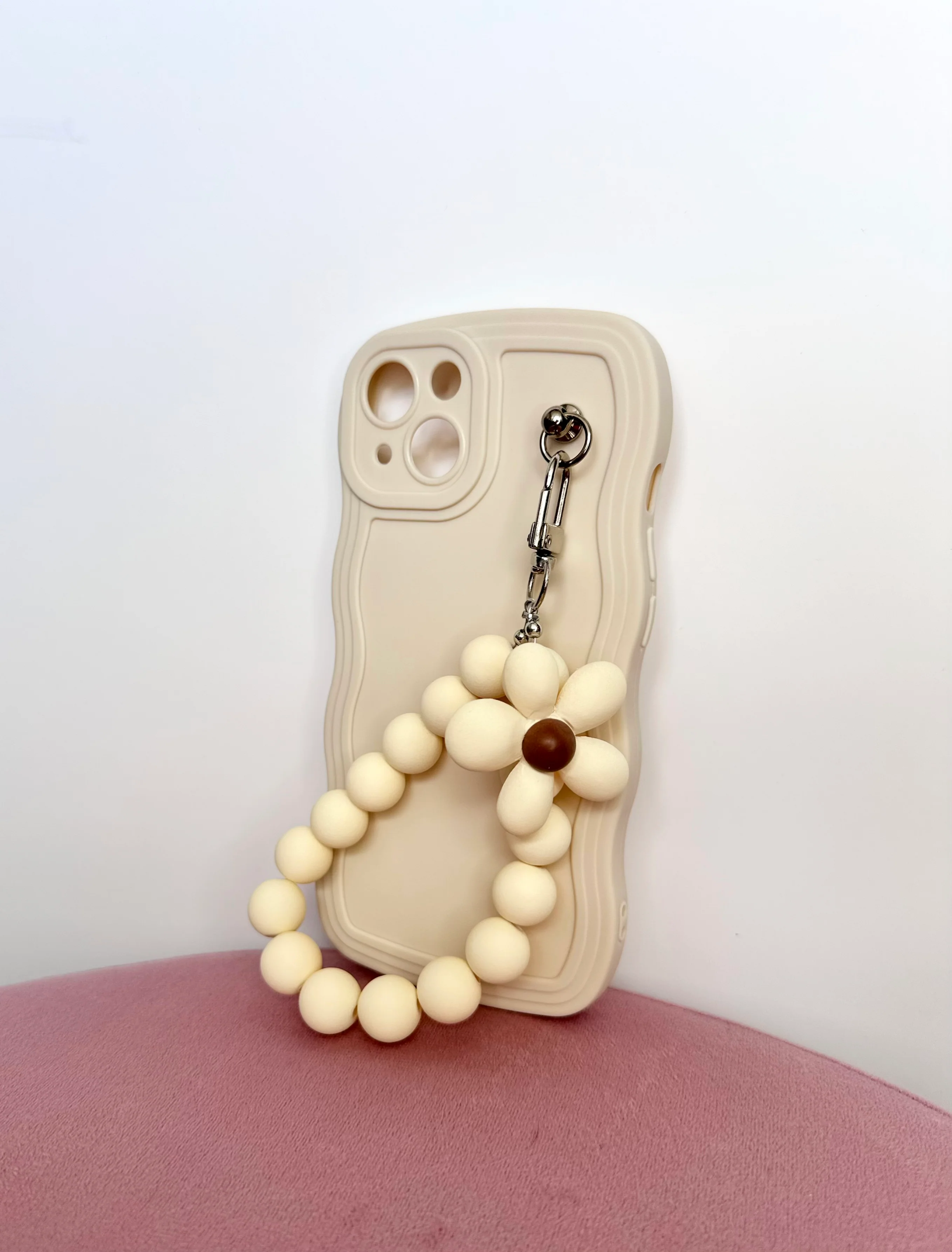 Wavy Edge Flower Pendant Cream Phone Case featuring a Chic Wrist Strap