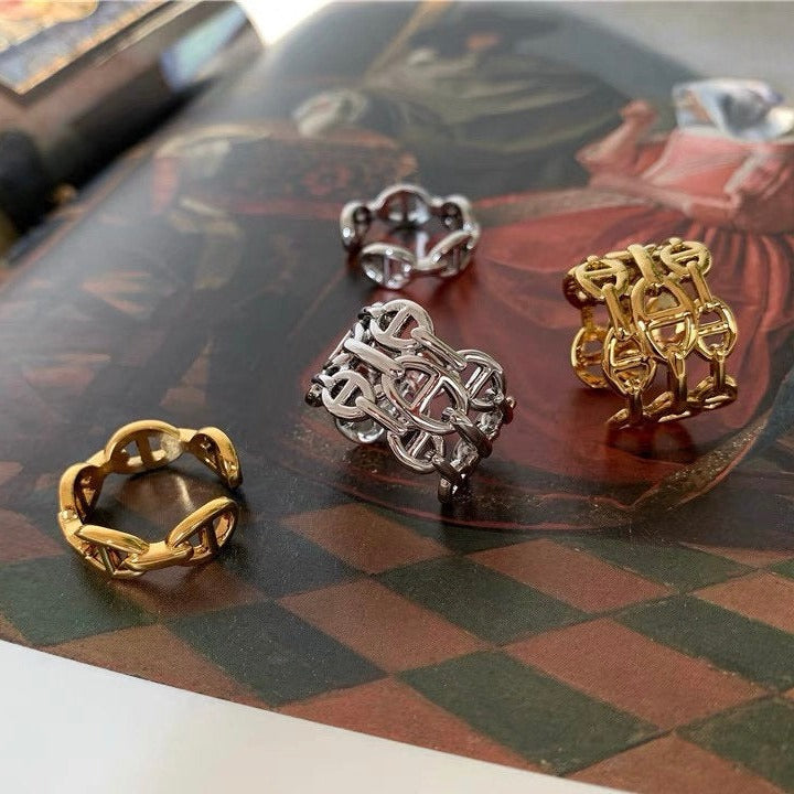 Dainty chain link statement rings