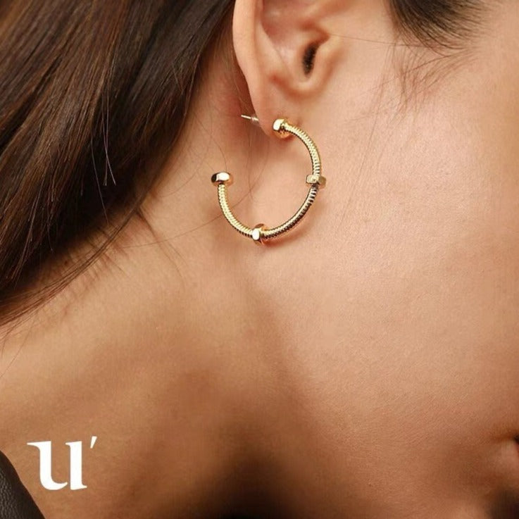 Golden nail huggie hoop earrings