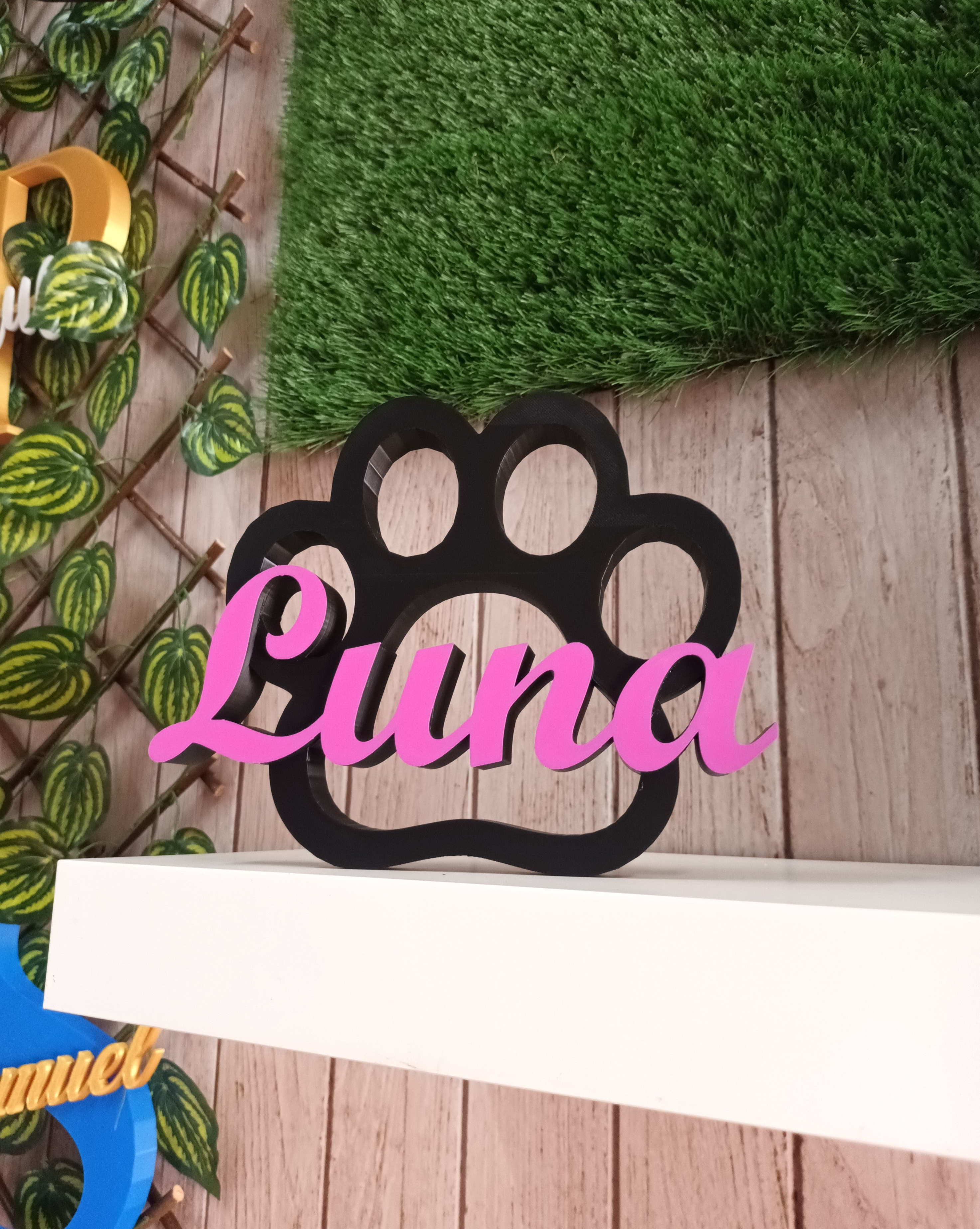 Huella de perrito con nombre impreso en 3D
